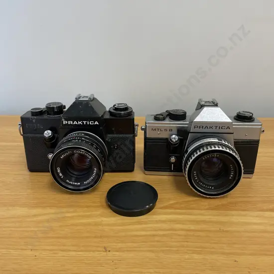 Two Vintage Praktica Cameras: EE2 Model and MTL5B Model. With Lenses