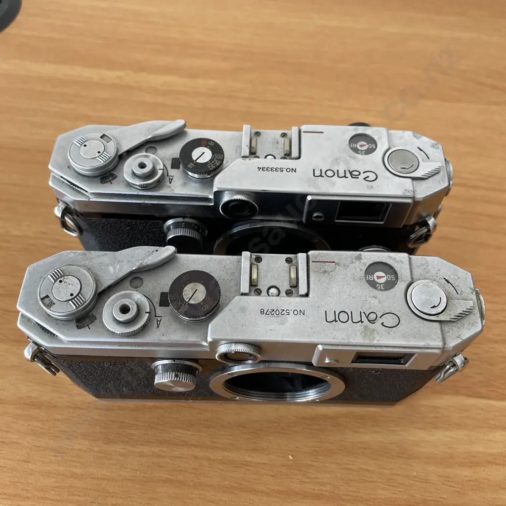 Pair of Vintage Canon Model L2 Cameras. No 520278/533334 Image 1++