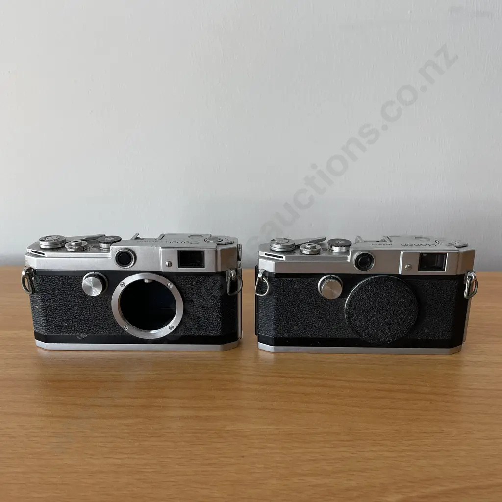 Two Vintage Canon Cameras. Model L2 No520977 and L3529861 Image 1++