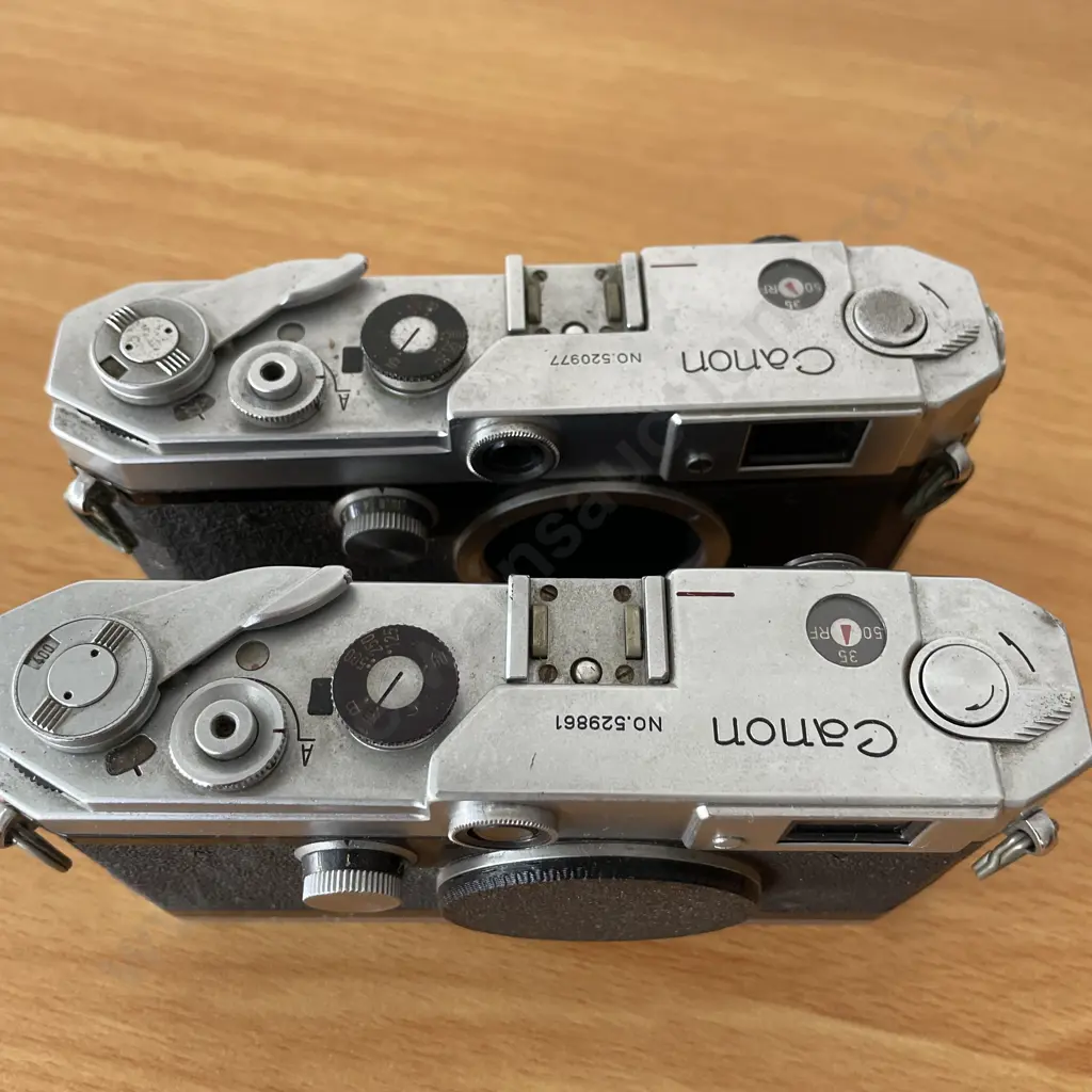 Two Vintage Canon Cameras. Model L2 No520977 and L3529861 Image 1++