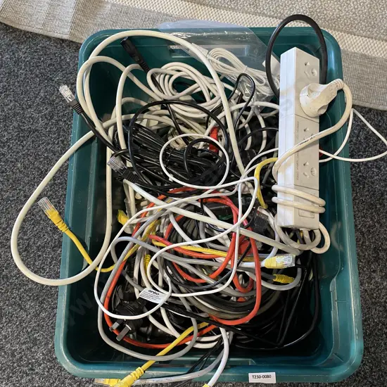 Green Plastic container with Electrical cords, Multiboards etc