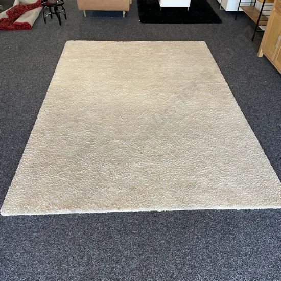 X-Large Cream Wool Floor Rug. 3.3m x 2.2 metres