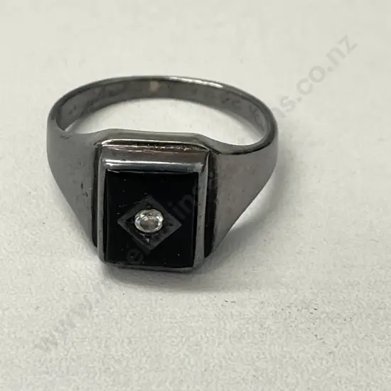 Sterling Silver Mens Ring with Black Gemstone and Diamond?