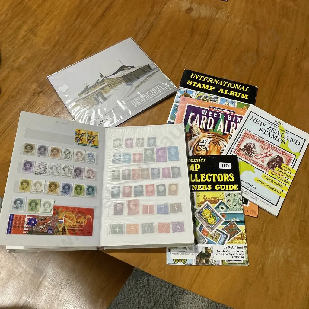 Assortment of Stamp Albums and Stamp Catalogues etc Image 1++