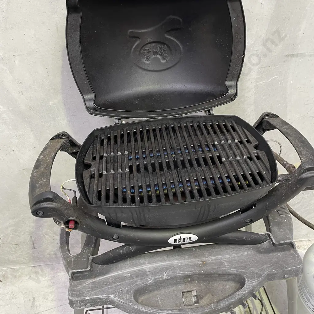 Weber Baby Q portable BBQ and stand with gas bottle. Working condition as shown in photos. Image 1++