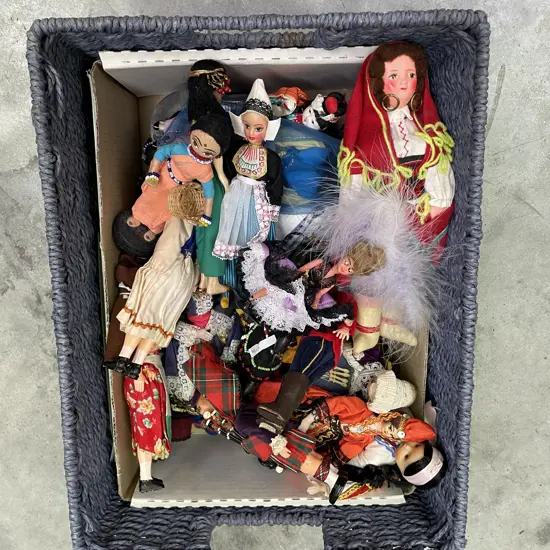 Woven Blue Basket with large assortment of World Dolls