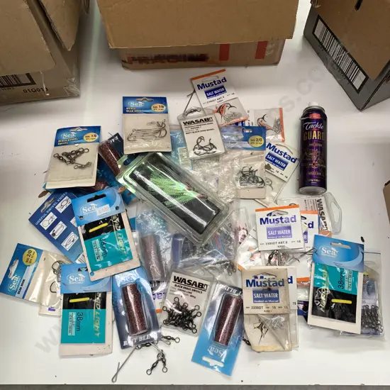 Box of assorted fishing hooks etc