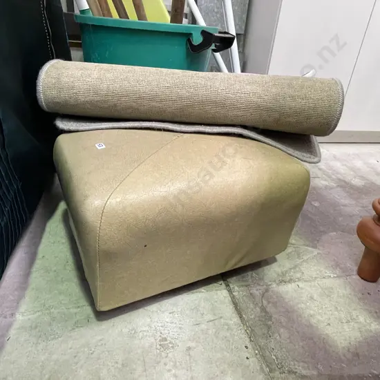 Retro vinyl footstool on wheels with oatmeal floor mat
