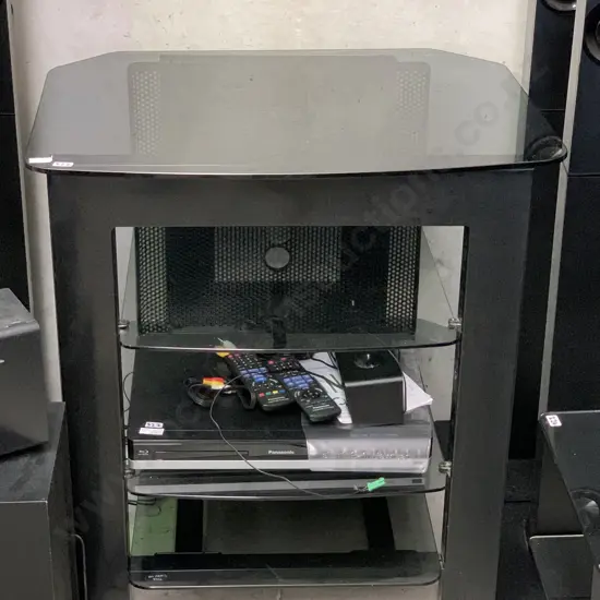 Modernist 4 Tier Entertainment Unit. Black smoke glass. H73 W70 D56cm