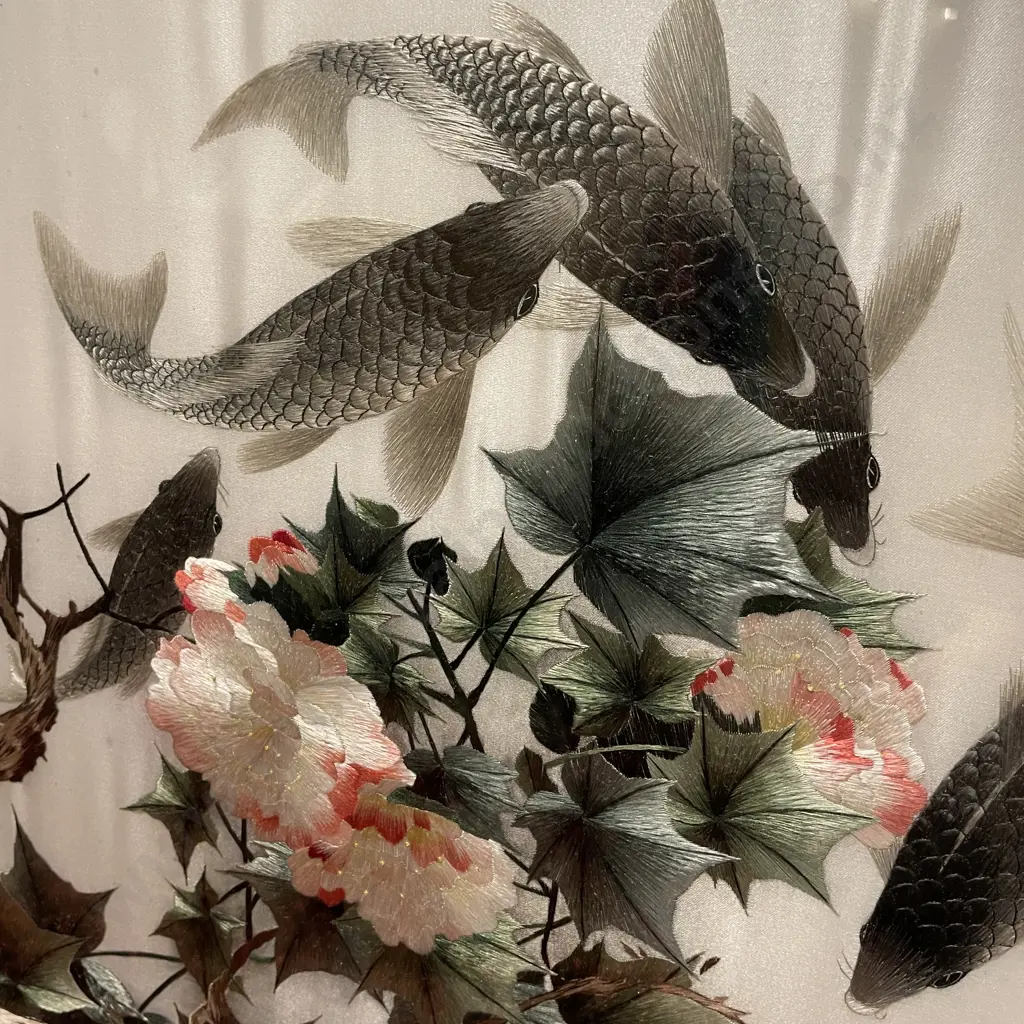 Framed Silk Artwork of flowers and Koi fish. Metallic accents. Silver framed. 70 x 70cm including frame. Image 1++