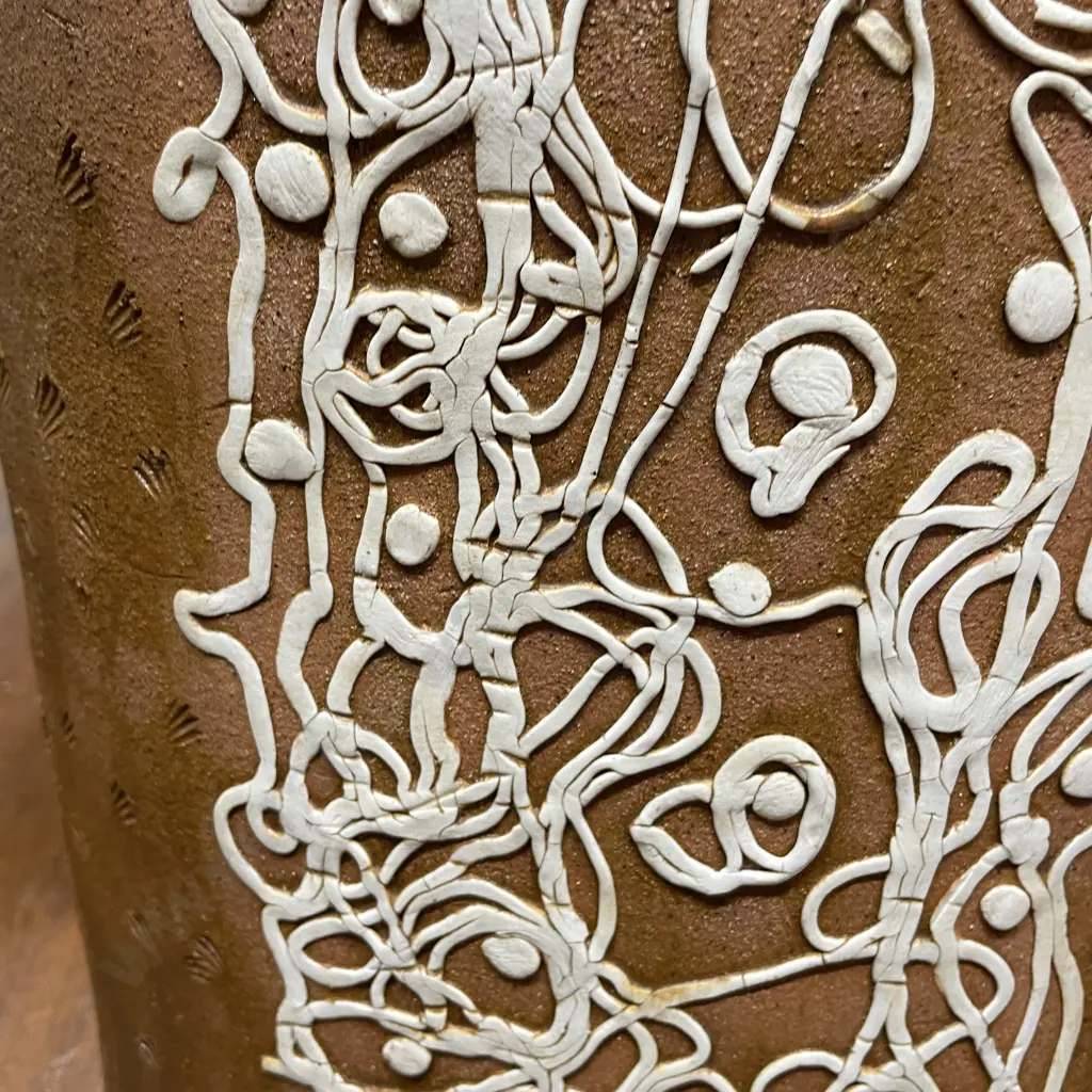 Large Slender Top Hat shaped Vase with applied decoation. H31cm. W32, D14cm. Signed J L Image 1++