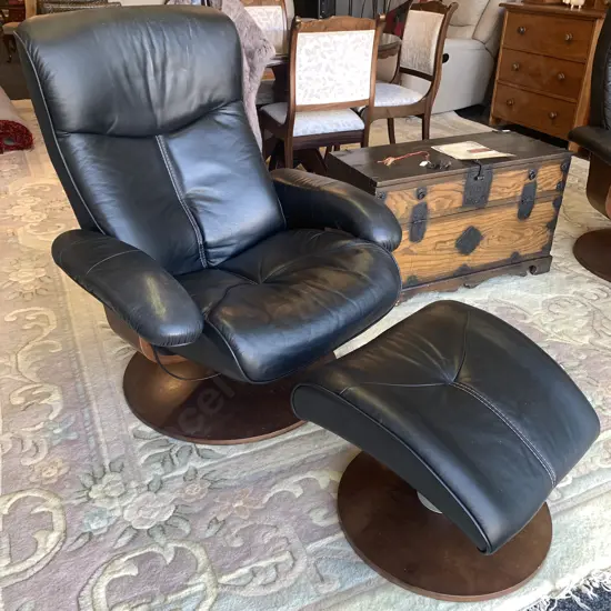 Vintage Black Leather Swivel and Reclining Armchair with footstool