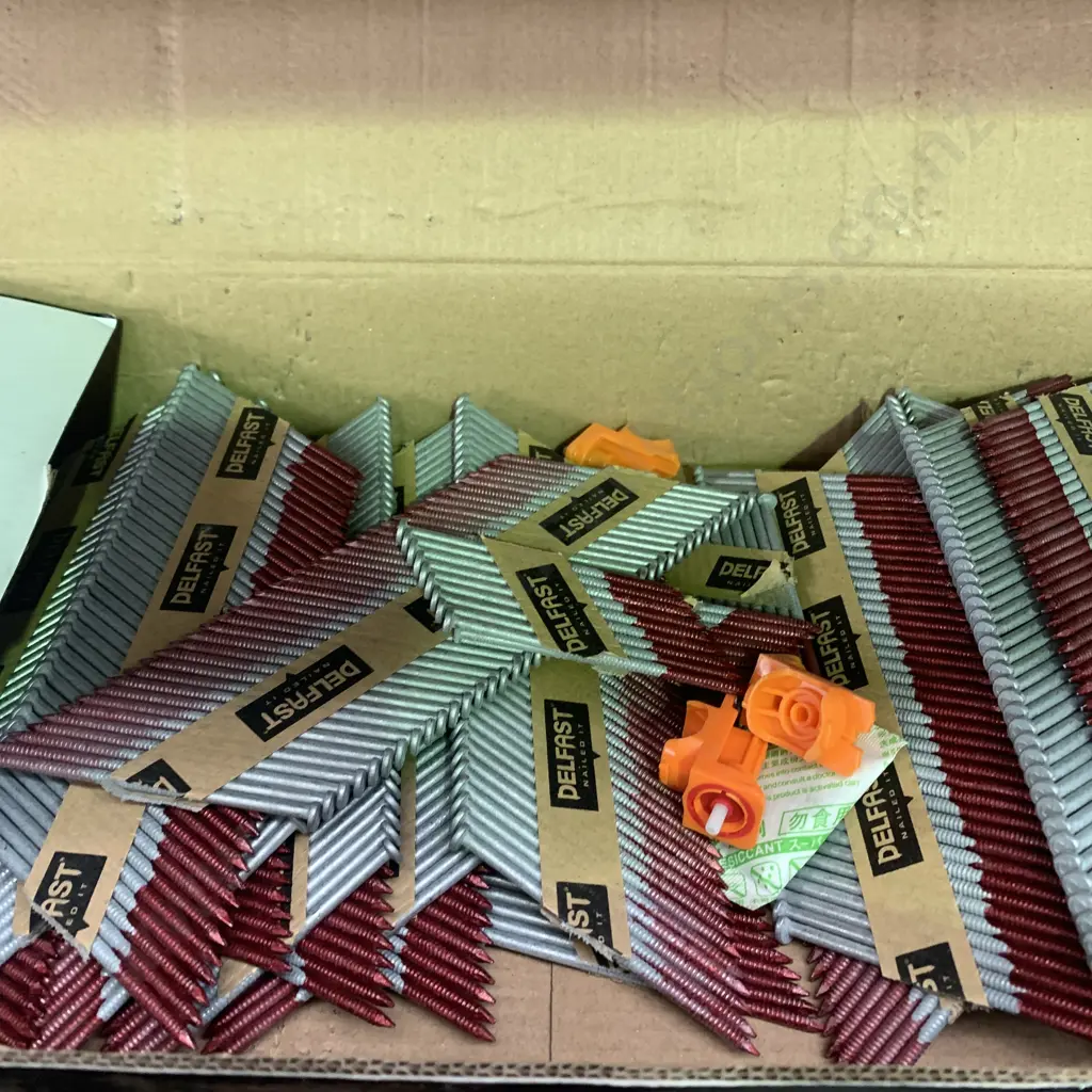 Box of Paslode Delfast Bright Steel D Head Nails with Two Fuel Cells with Half Box Paslode Nails Image 1++