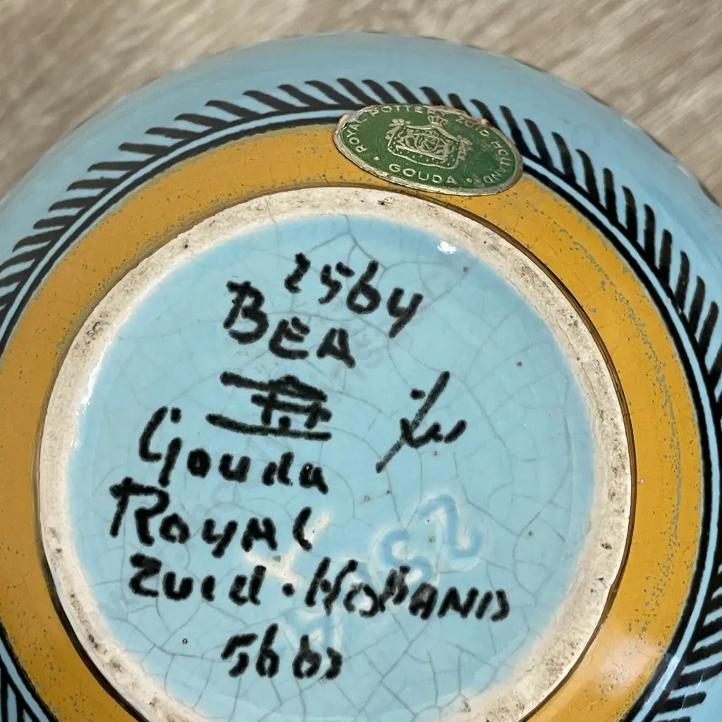 Stunning Gouda Art Pottery Vase. Signed as shown. Teal, white, yellow and black decoration. H14cm Dia13cm Image 1++