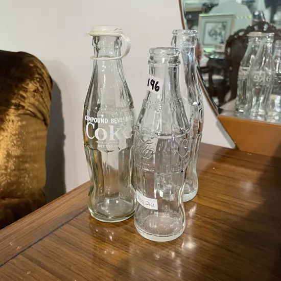Three Vintage Coke Coca-Cola bottles