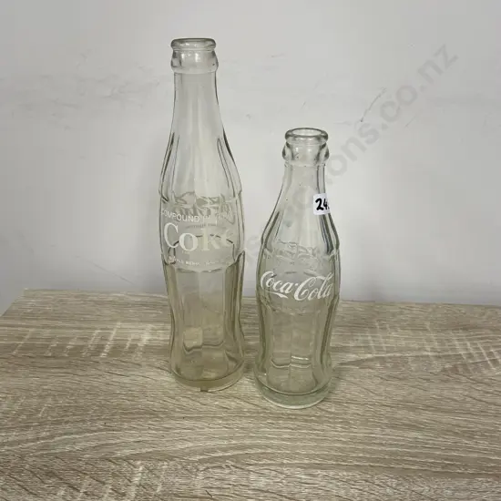 Vintage Coca-Cola Bottles. 1957 and ISP 148