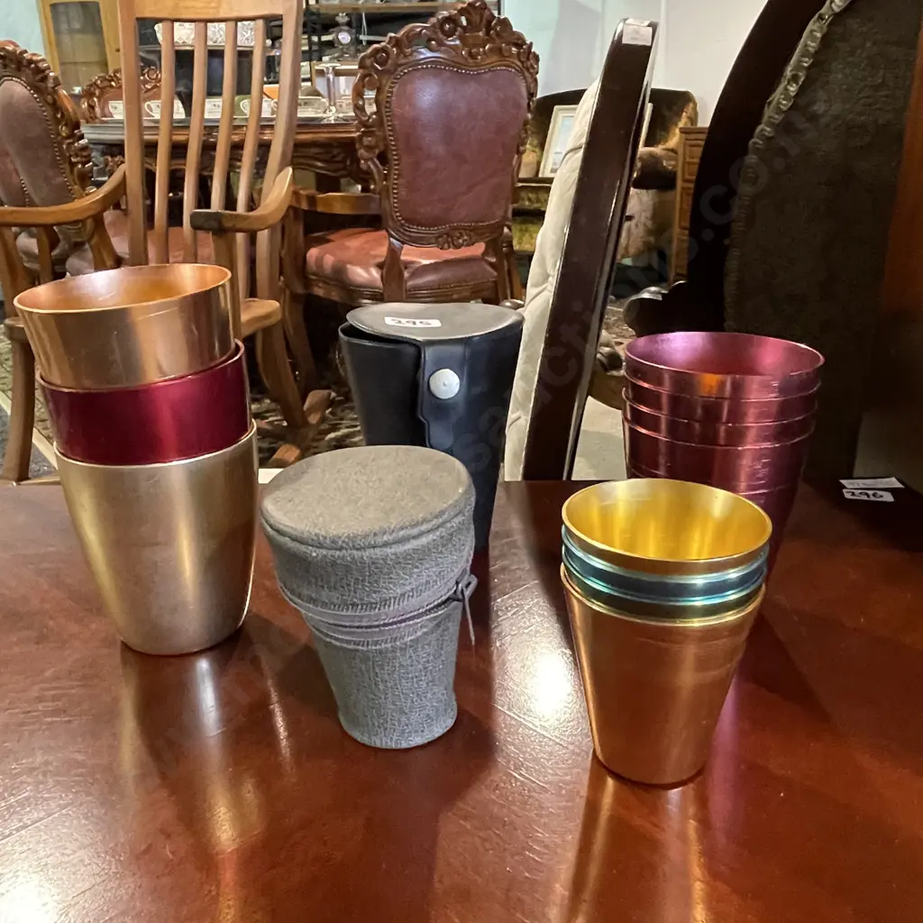 Vintage Collection of Andodised Coloured Beakers - with two cases Image 1++