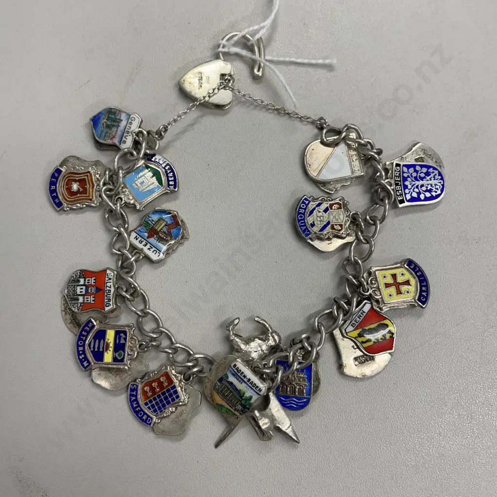 Sterling Silver Charm Bracelet with large assortment of Sterling Silver Shield and other charms  Image 1++