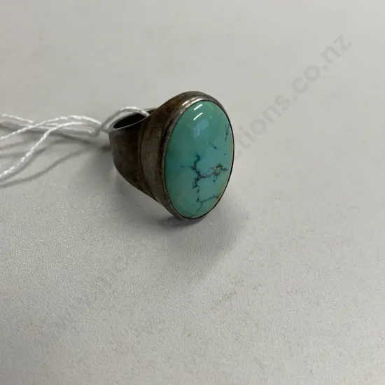 Large Sterling Silver Ring with Turquoise Gemstone. Stone is 27 x 18mm