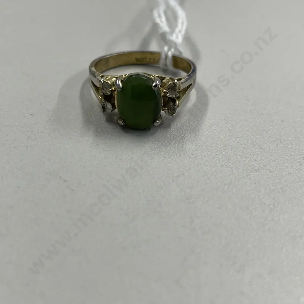 Hallmarked Dress Ring, with Diamonds/Jade setting. Repair evident Image 1++