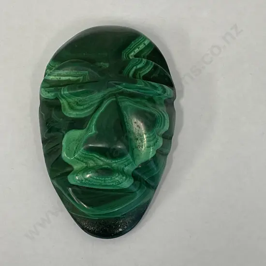 Malachite Carved Tribal Mask. 8 x 5cm x 2.5cm