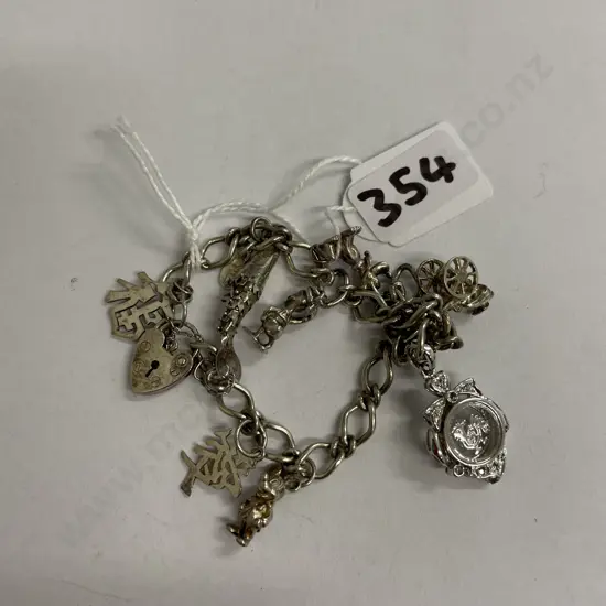 Sterling Silver Charm Bracelet with assorted Charms