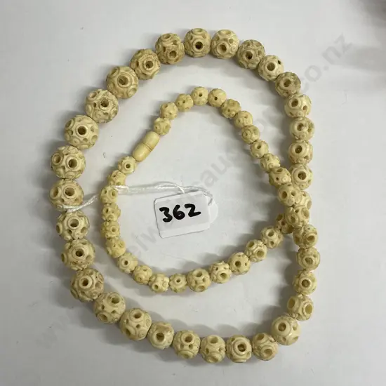 Antique Ivory Carved Ball Necklace. Varying sized balls. Screw Clasp