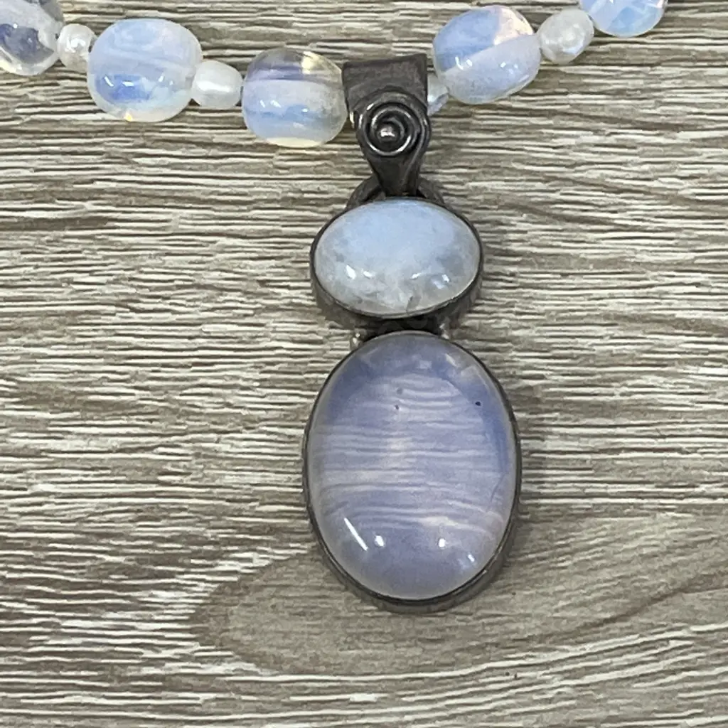 Stunning Vintage Opalescent Blue Glass bead necklace with intersecting pearls. Sterling silver mounted dual pendant.  Image 1++