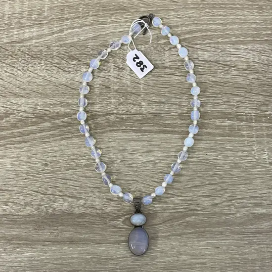 Stunning Vintage Opalescent Blue Glass bead necklace with intersecting pearls. Sterling silver mounted dual pendant. 