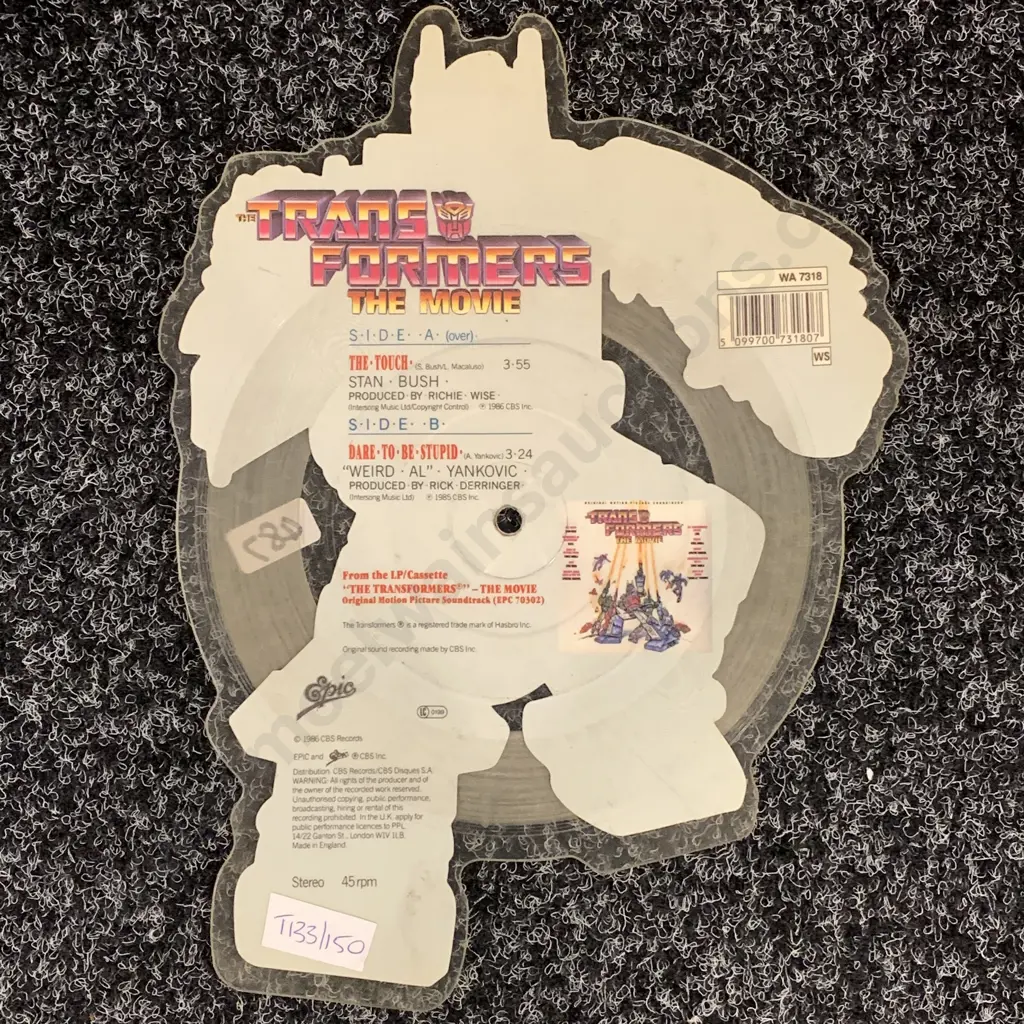 Vintage Shaped Picture Disc Vinyl Record. Transformers The Movie "The Touch" and "Dare to be Stupid" Image 1++